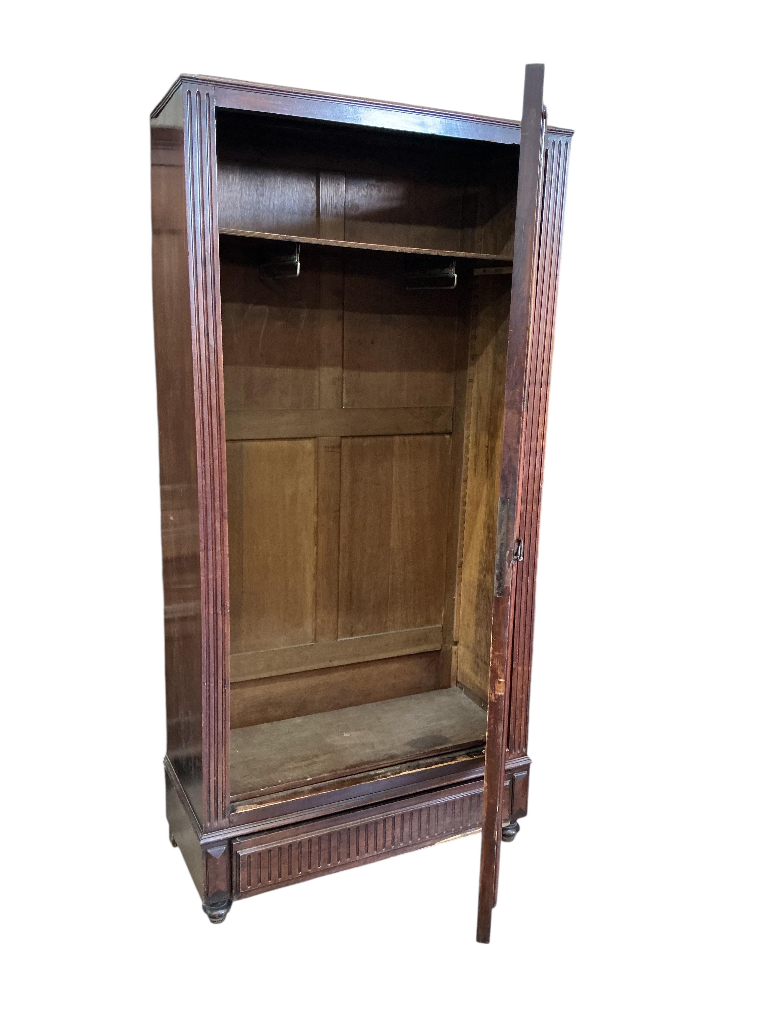 A 19th century French mirrored mahogany armoire, width 98cm, depth 43cm, height 201cm